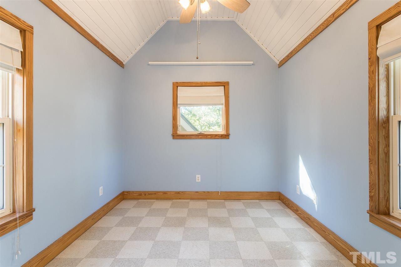 700 Method Road Raleigh, NC 27607 - Photo 17 of 29 a view of an empty room with a window
