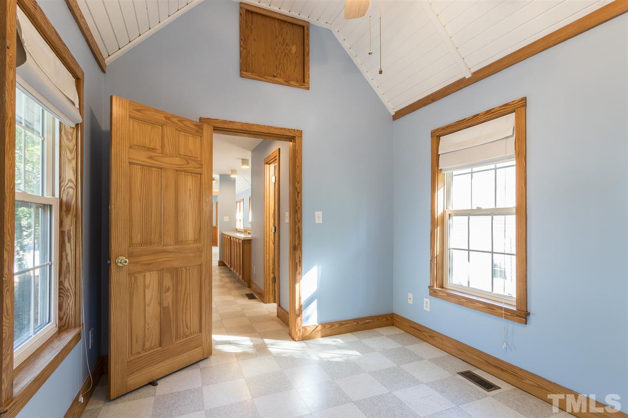 700 Method Road Raleigh, NC 27607 - Photo 18 of 29 a view of an empty room with a window
