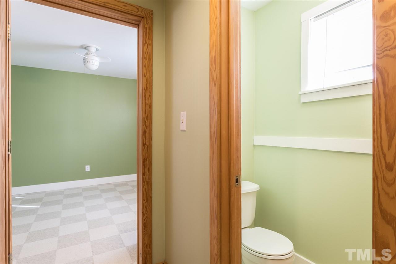 700 Method Road Raleigh, NC 27607 - Photo 29 of 29 a bathroom with a toilet and a shower