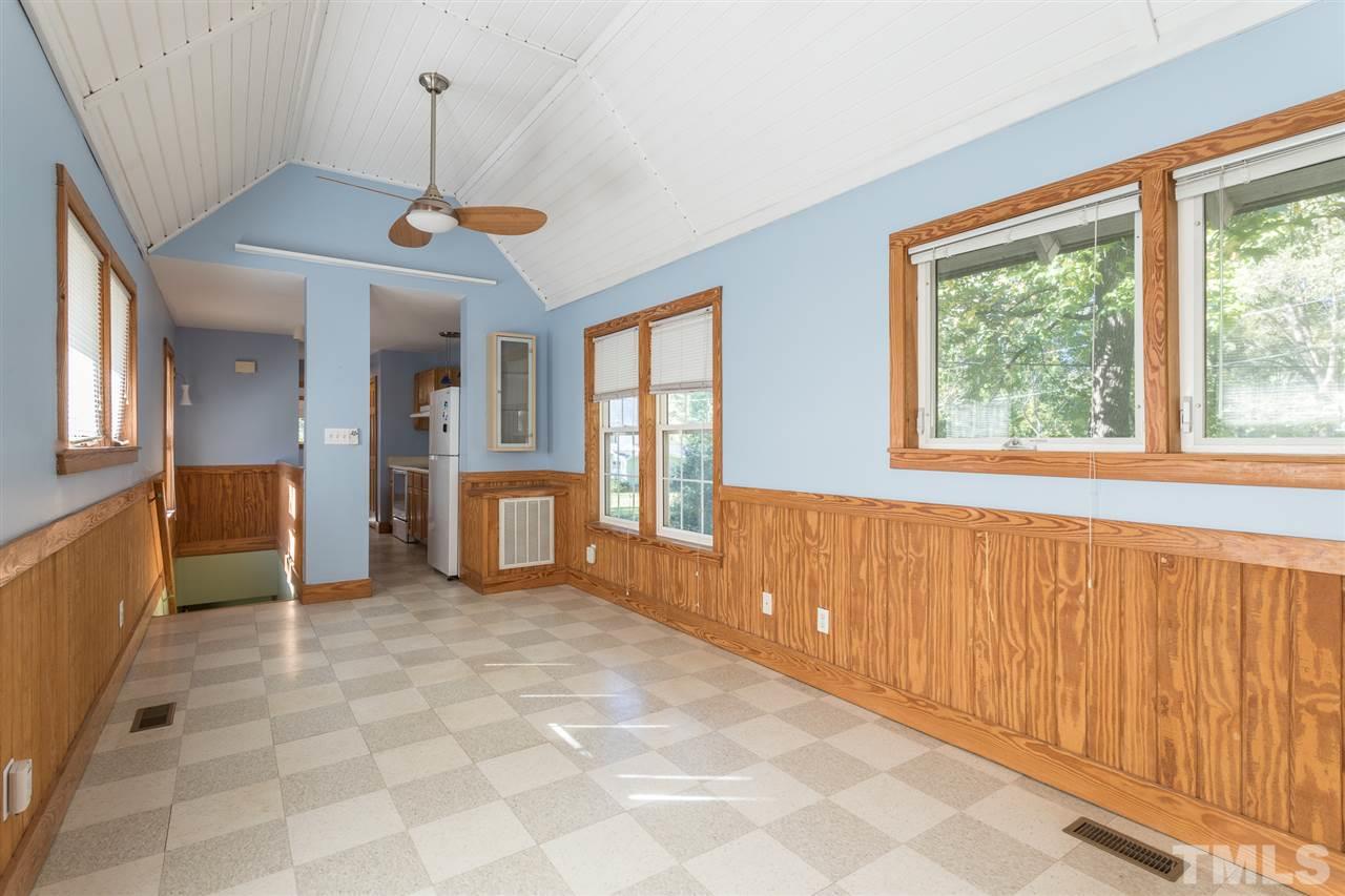700 Method Road Raleigh, NC 27607 - Photo 10 of 29 a view of an empty room with a window