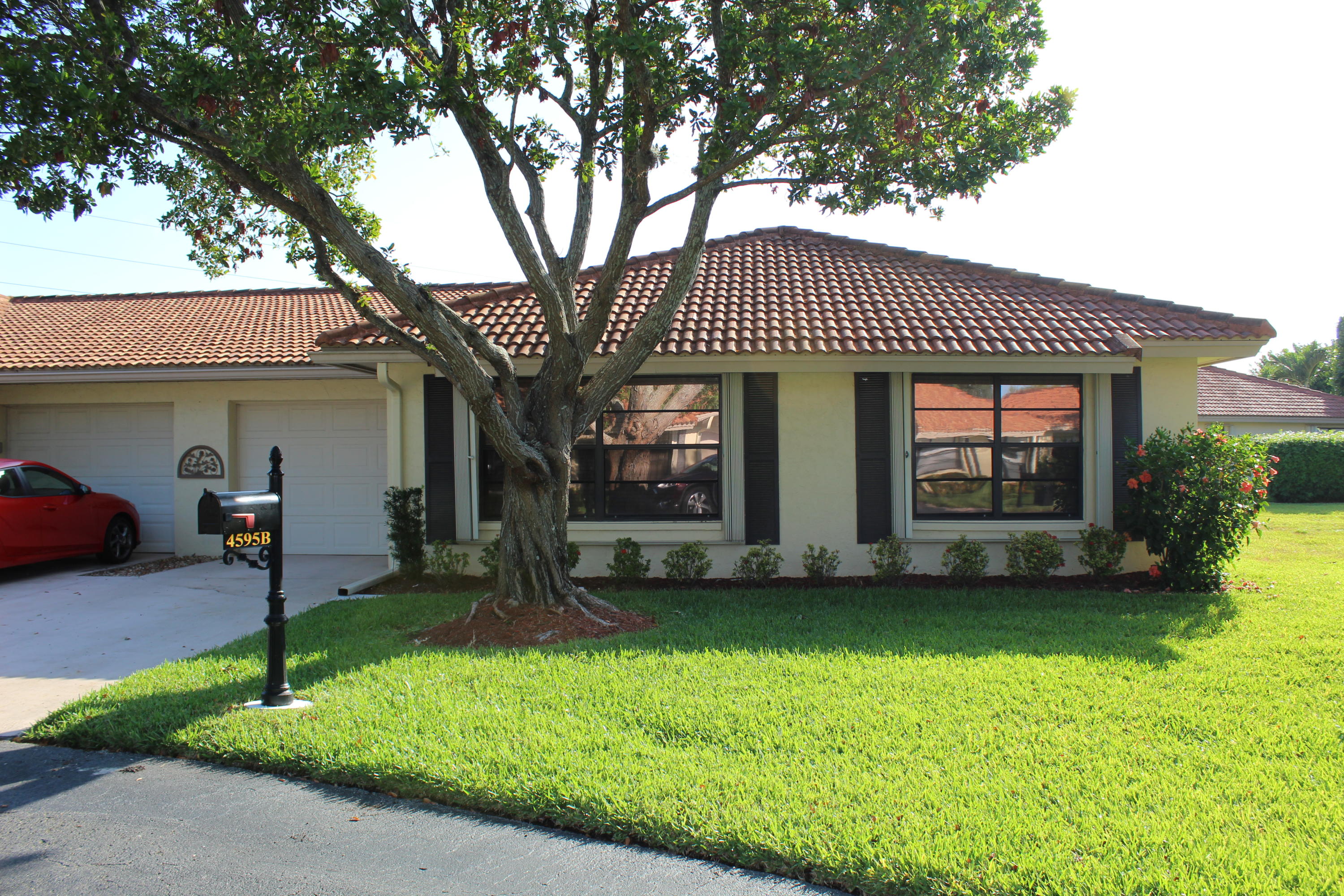 4595 Laurel Tree Road, Unit B Boynton Beach, FL 33436 - Photo 1 of 31 Front of Villa
