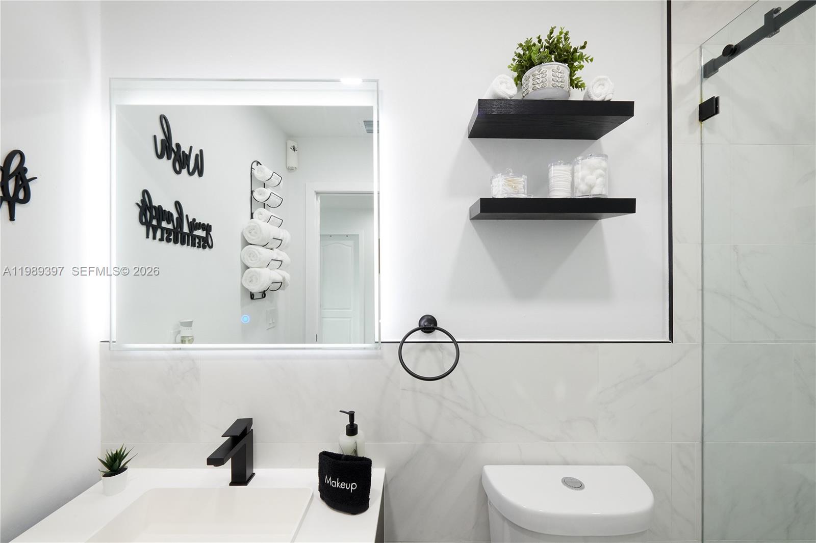 12293 Southwest 28th Terrace Miami, FL 33175 - Photo 19 of 25 a bathroom with a sink and mirror