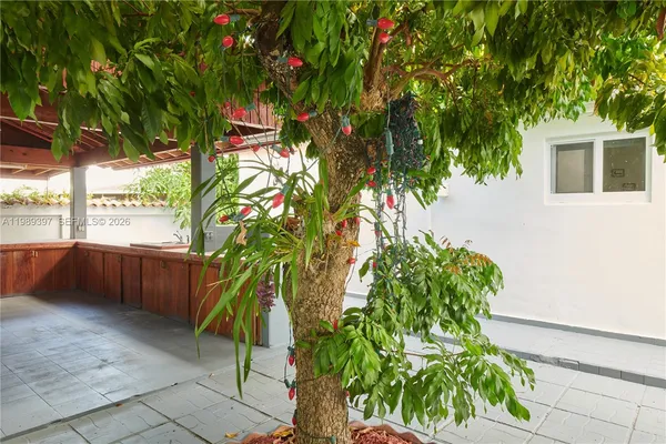 a backyard of a house with lots of green space