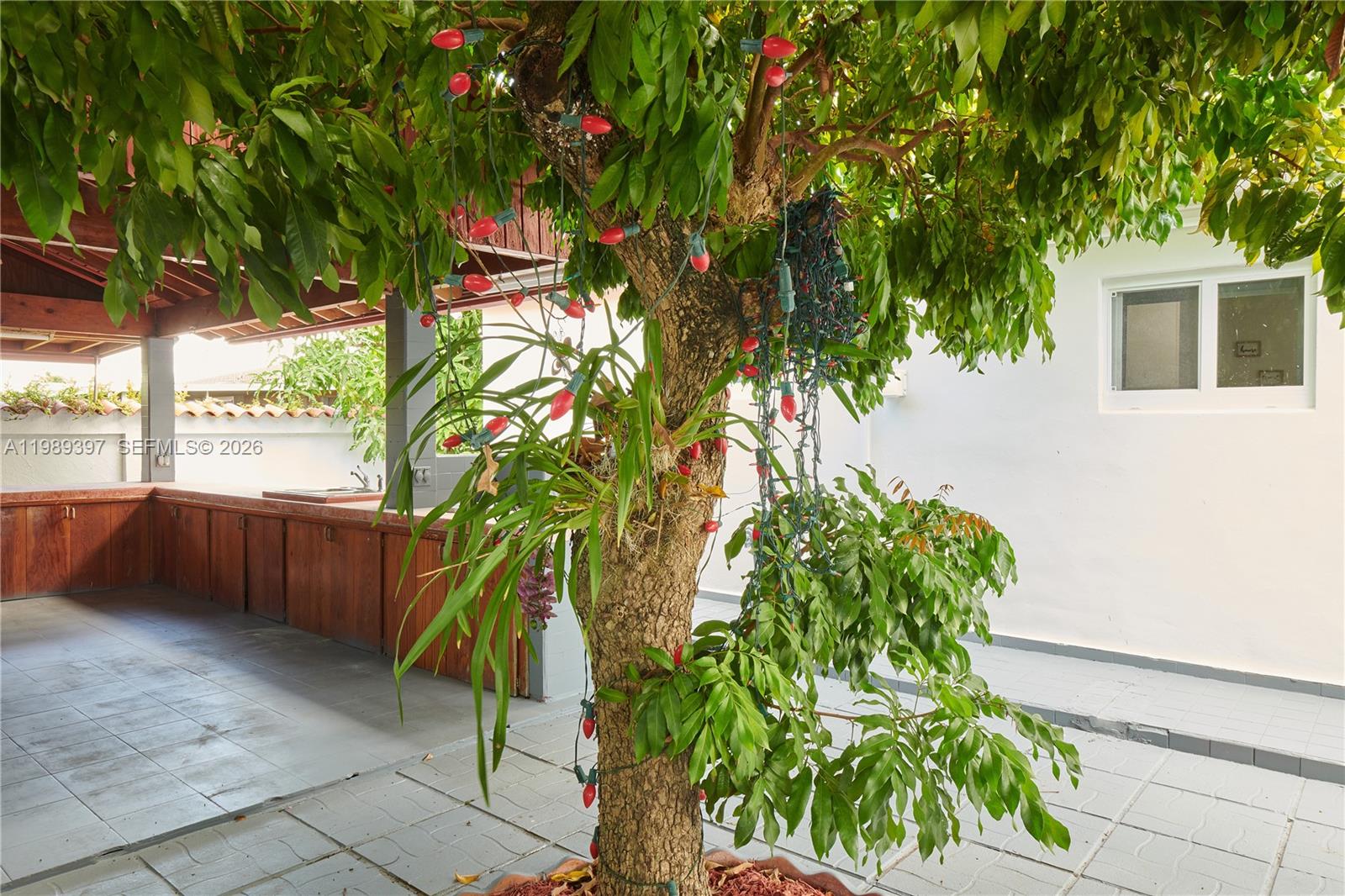 12293 Southwest 28th Terrace Miami, FL 33175 - Photo 24 of 25 a backyard of a house with lots of green space