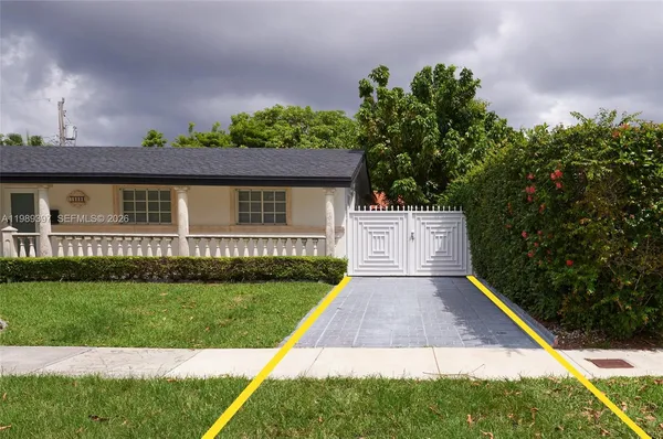 a view of backyard with green space