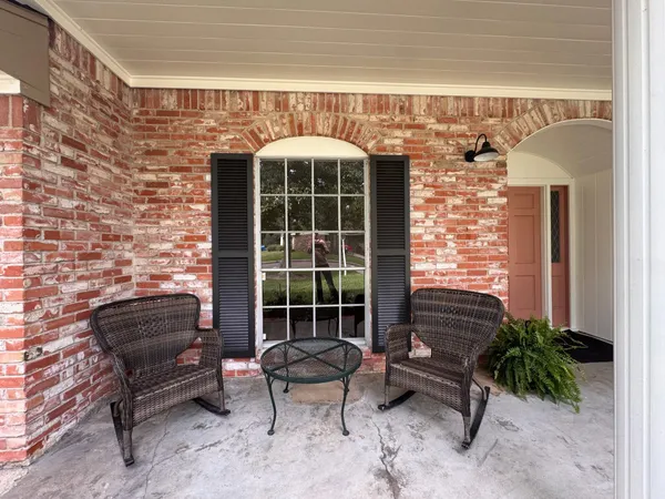 a building outdoor space with patio furniture