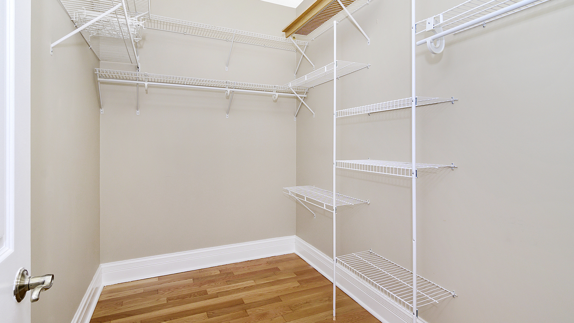 4918 South St Lawrence Avenue, Unit 3 Chicago, IL 60615 - Photo 9 of 16 a view of a room with racks on the wall