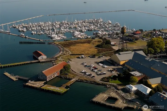 a view of a lake with houses with outdoor space
