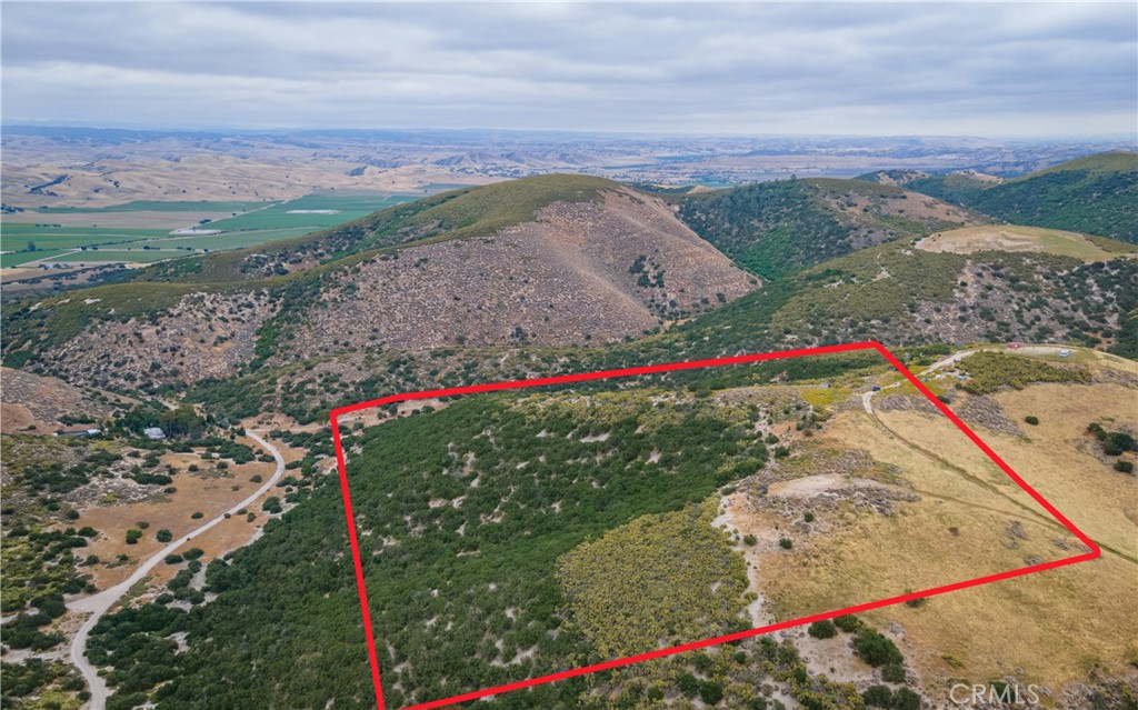 1 Jolon Road Bradley, CA 93426 - Photo 1 of 1 a view of a road with a flower garden