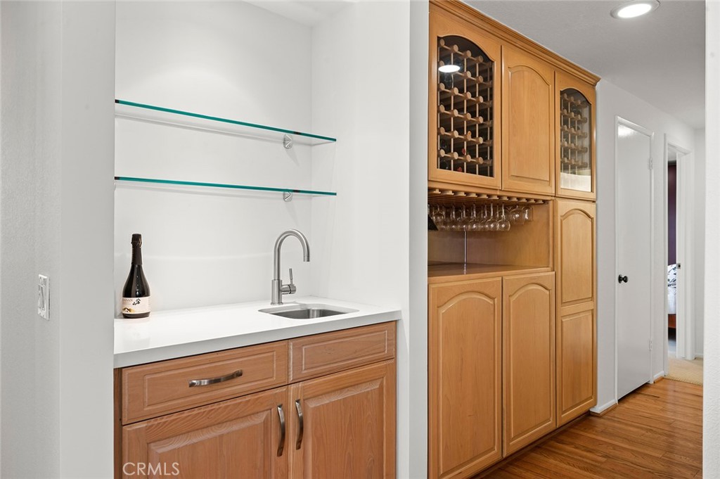17 Rippling Streme Irvine, CA 92603 - Photo 13 of 54 Built-in Shelves and Wine Bar