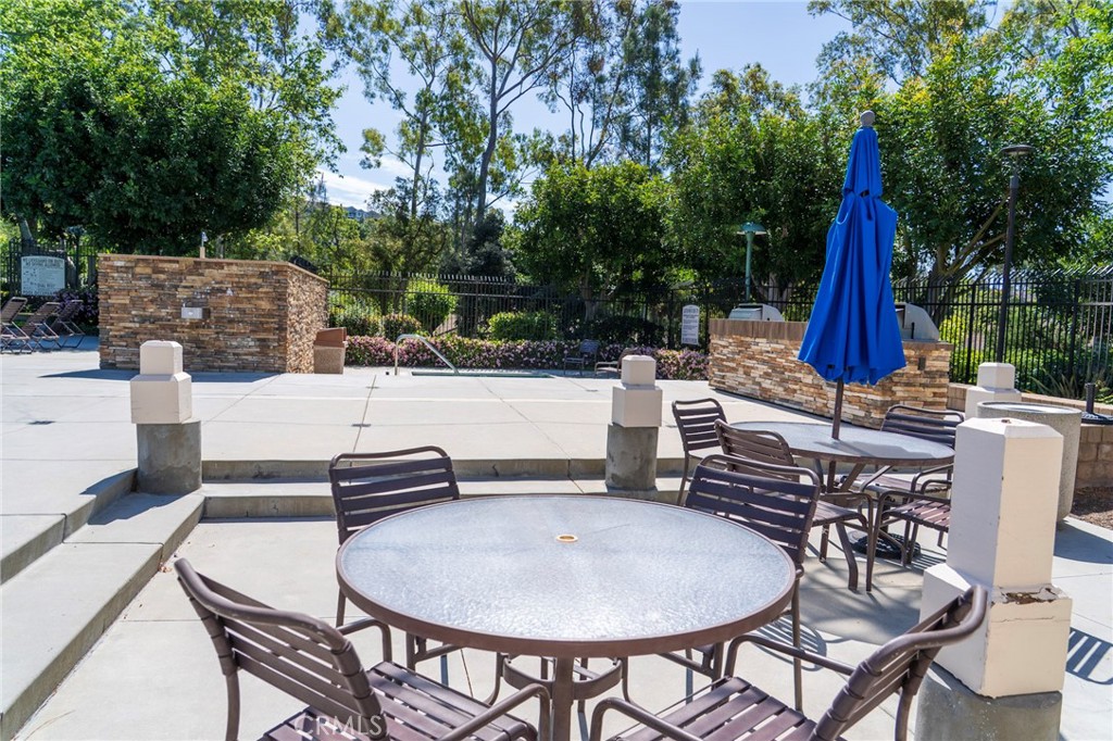 17 Rippling Streme Irvine, CA 92603 - Photo 48 of 54 HOA Eating Area and BBQ's