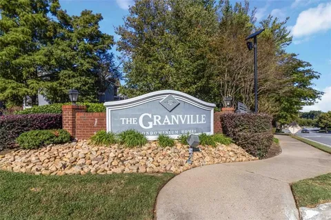 a view of a back yard of the house