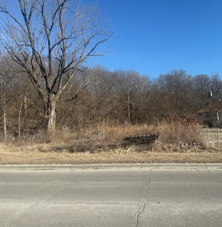 a view of road with snow on the road