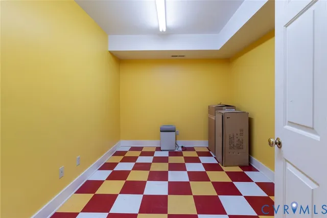 a walk in closet and a window