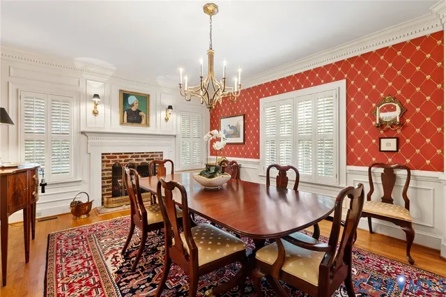 a dining room with furniture and window