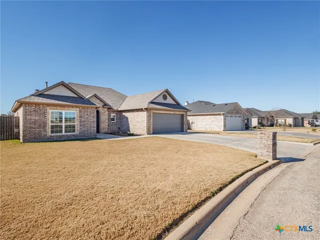 a house with trees in front of it
