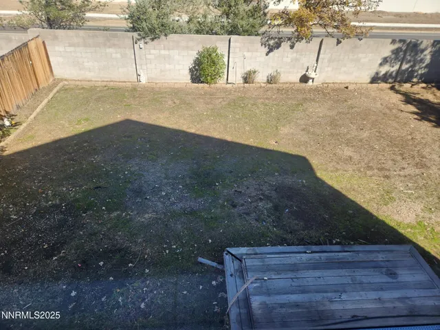 a view of a backyard of a house