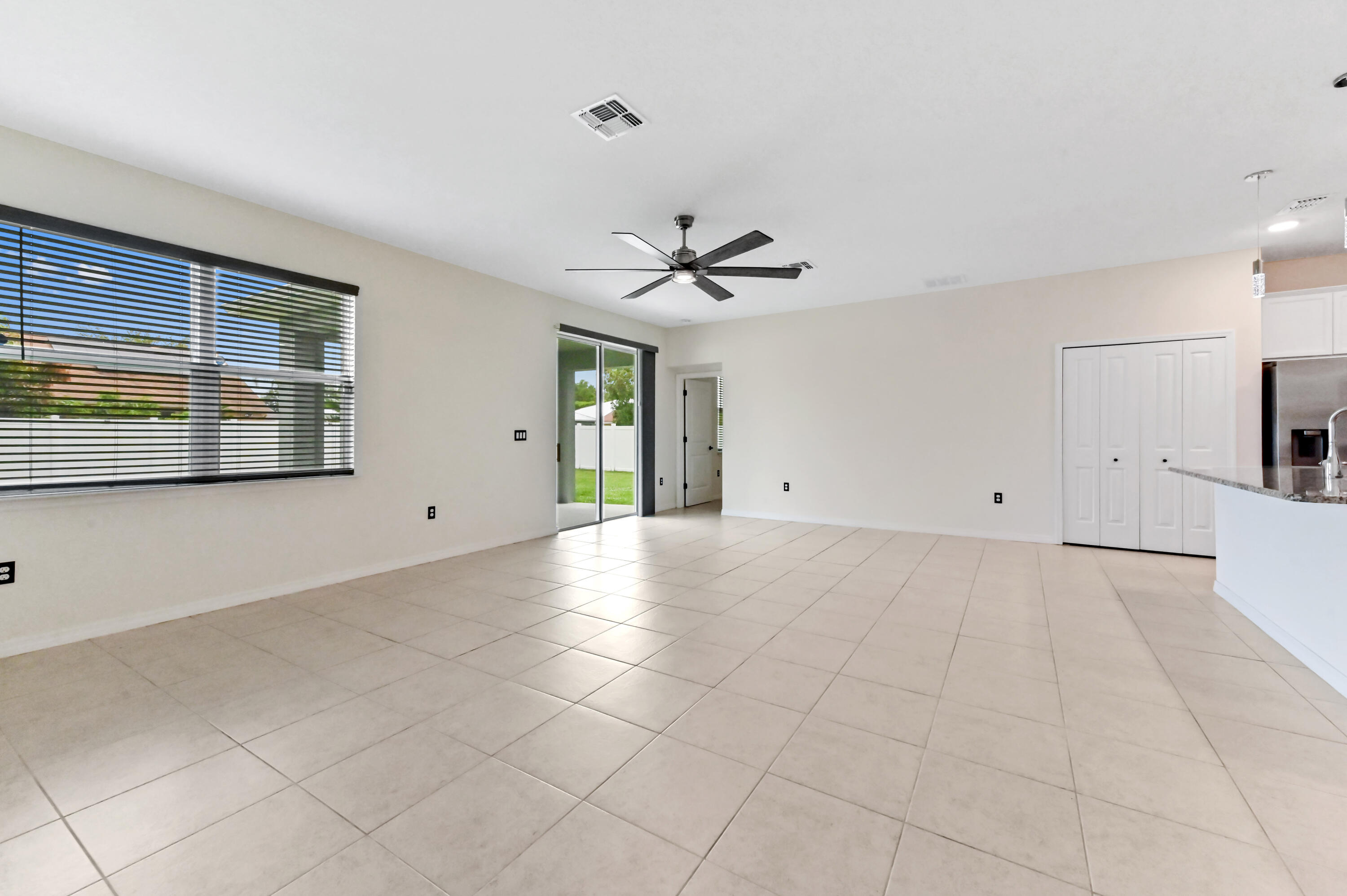 6700 Northwest Omega Road Port St. Lucie, FL 34983 - Photo 15 of 45 12 family room 01