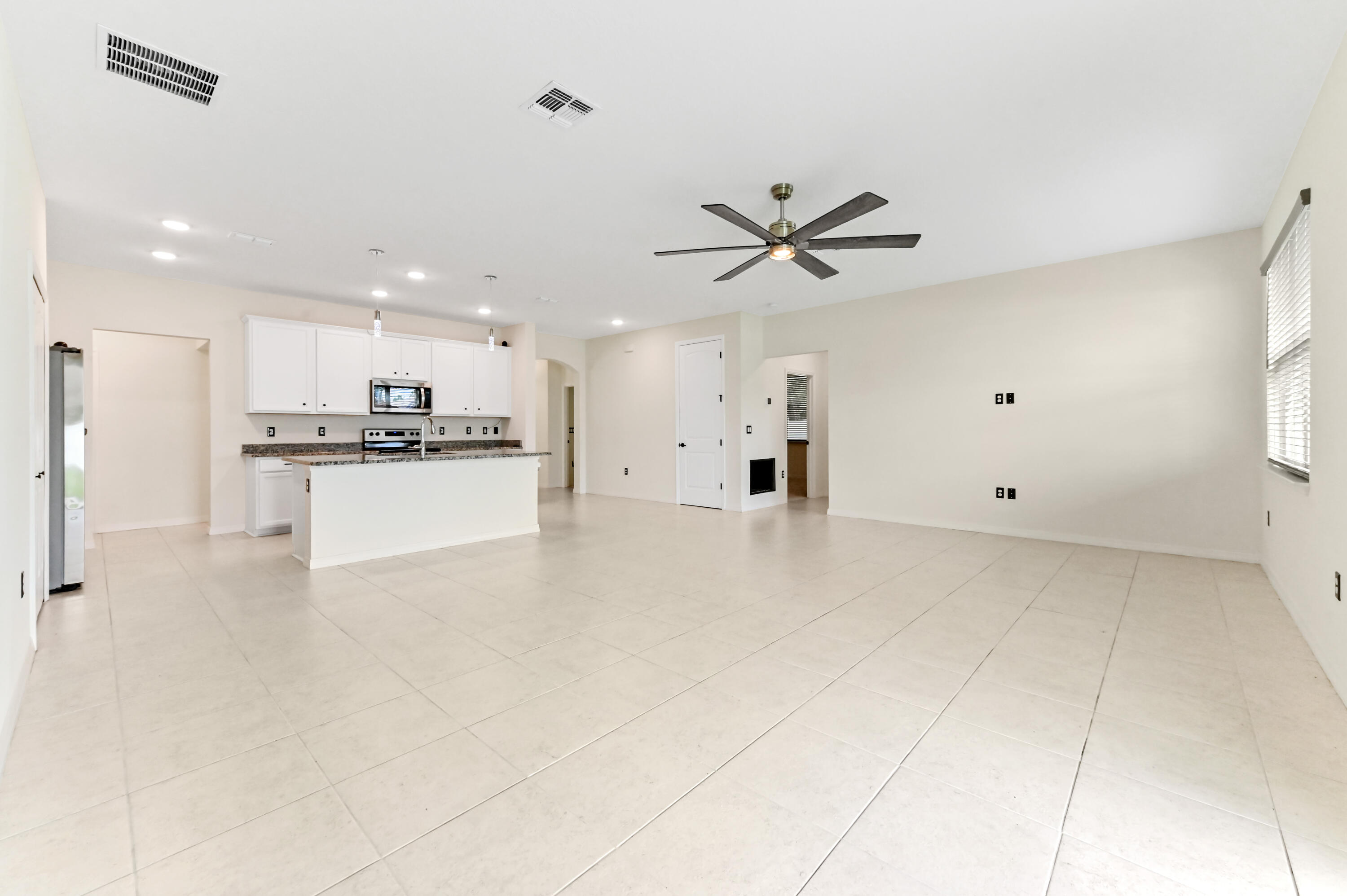 6700 Northwest Omega Road Port St. Lucie, FL 34983 - Photo 17 of 45 14 family room 03