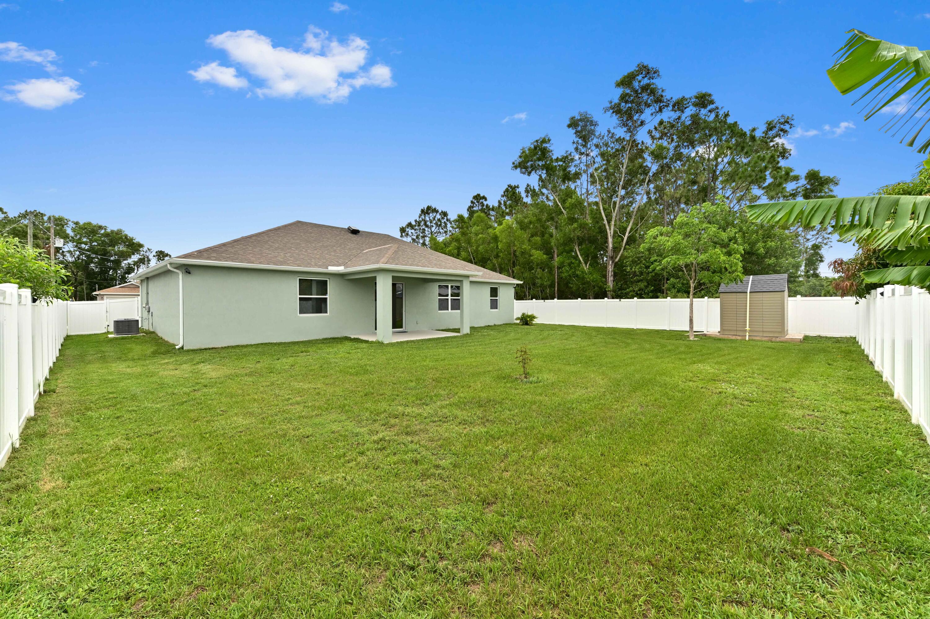 6700 Northwest Omega Road Port St. Lucie, FL 34983 - Photo 36 of 45 31 rear 02