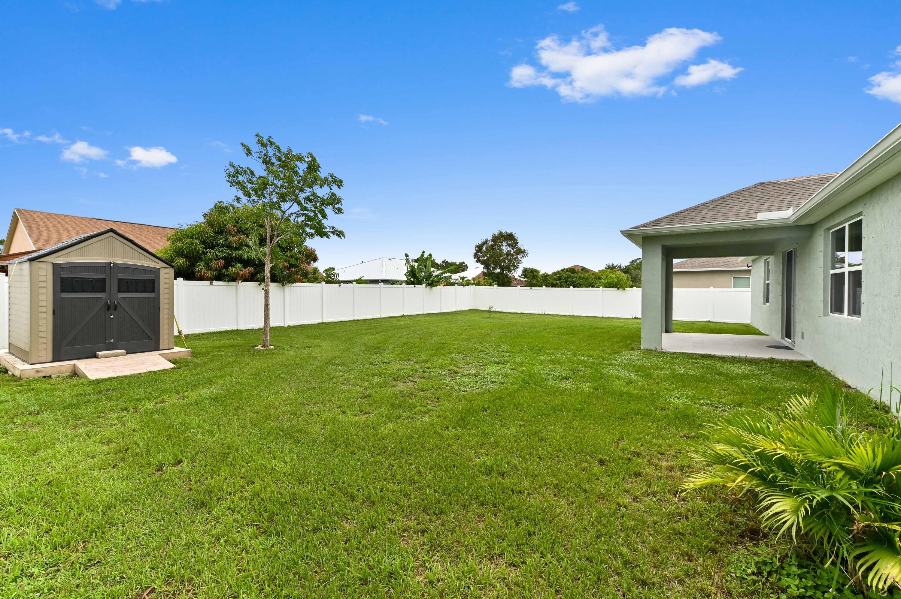 6700 Northwest Omega Road Port St. Lucie, FL 34983 - Photo 37 of 45 32 rear 03
