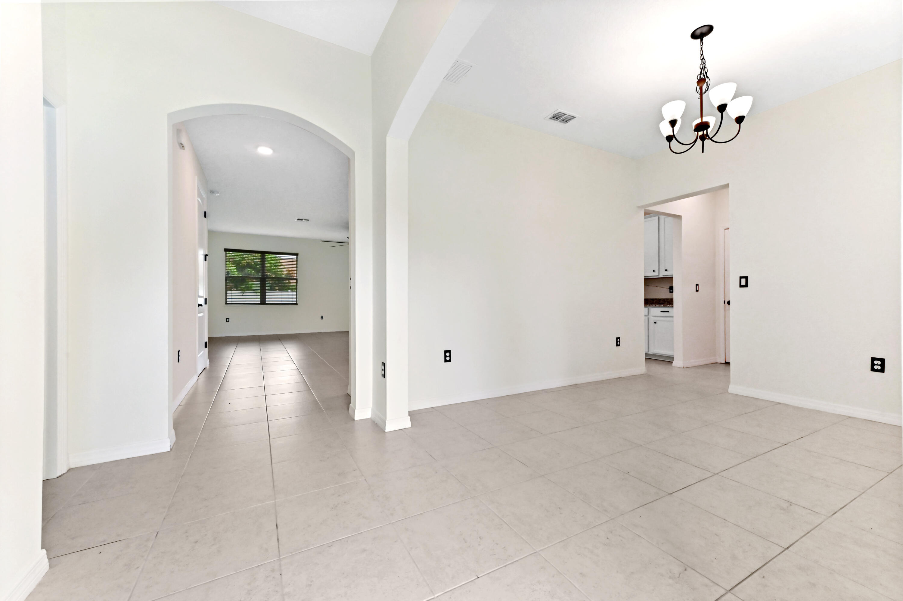 6700 Northwest Omega Road Port St. Lucie, FL 34983 - Photo 7 of 45 05 living room 01