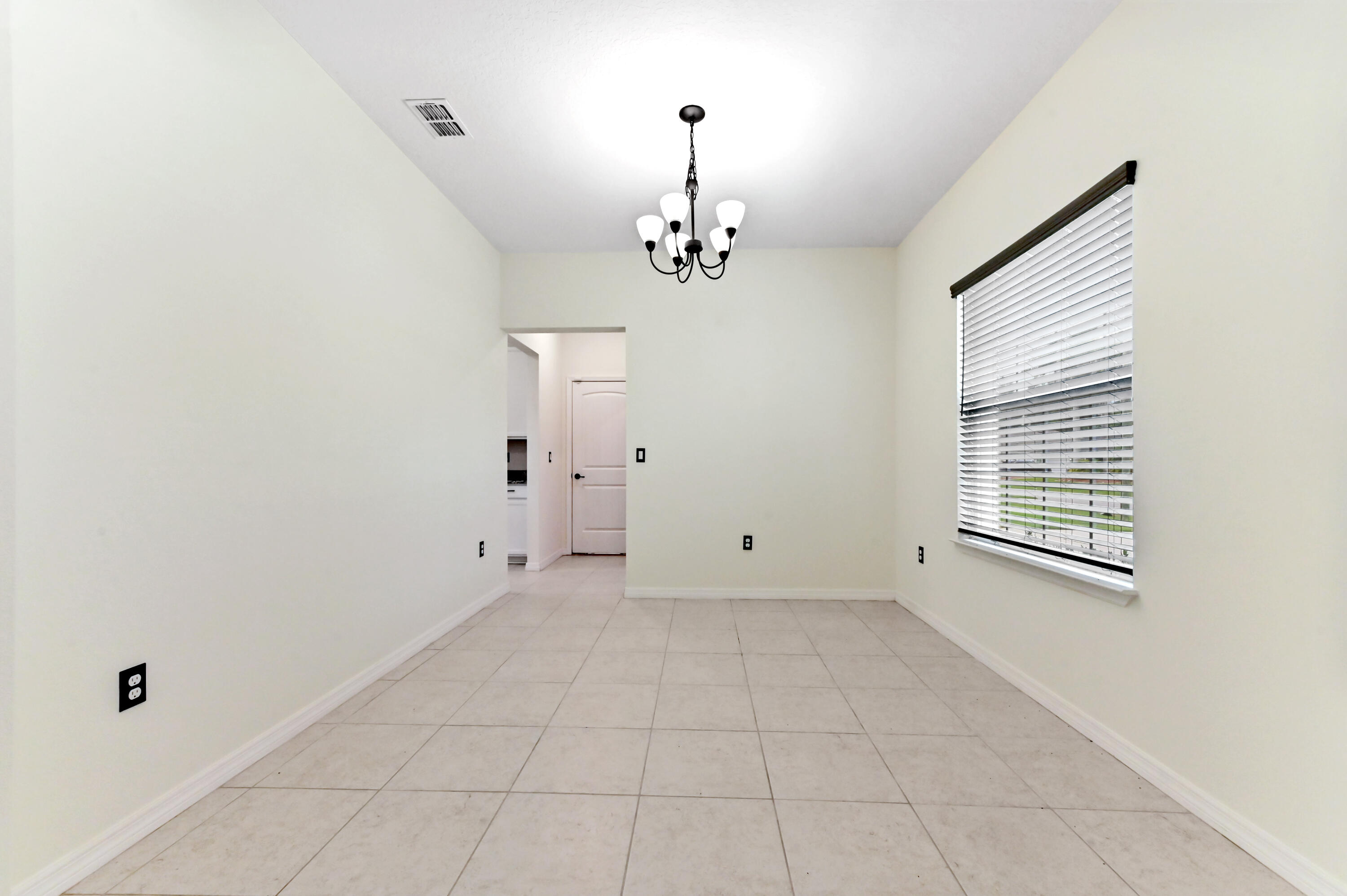 6700 Northwest Omega Road Port St. Lucie, FL 34983 - Photo 8 of 45 06 living room 02