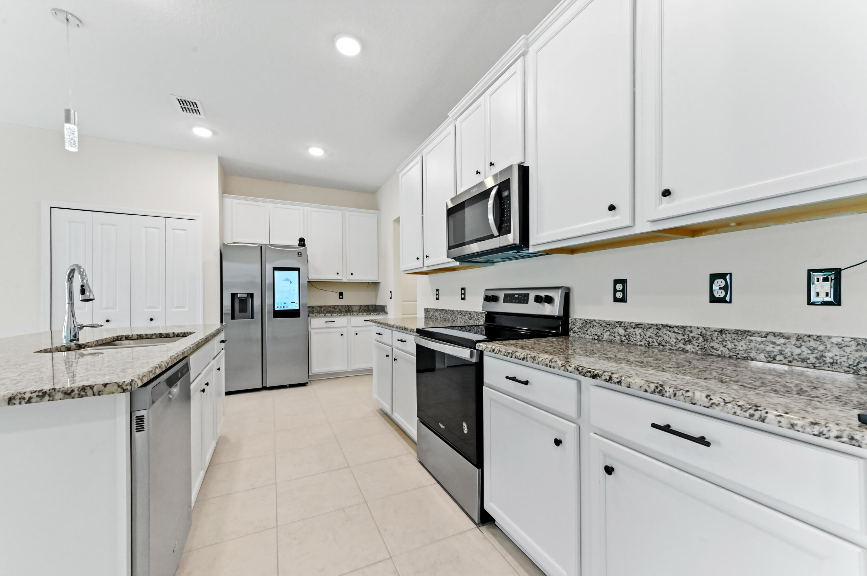 6700 Northwest Omega Road Port St. Lucie, FL 34983 - Photo 10 of 45 09 kitchen 02