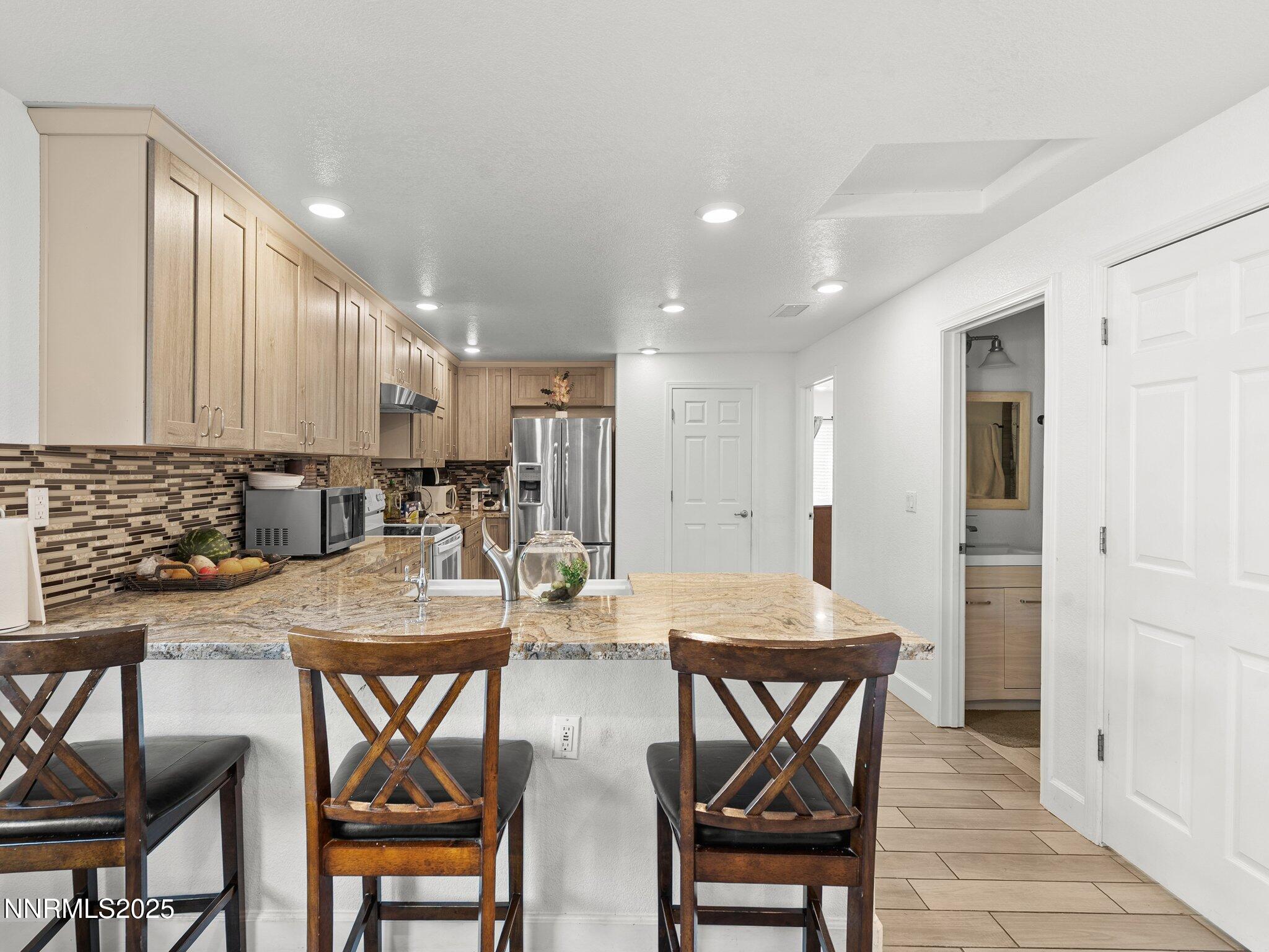 5216 Sun Valley Boulevard Sun Valley, NV 89433 - Photo 11 of 26 5216 Sun Valley Blvd-112