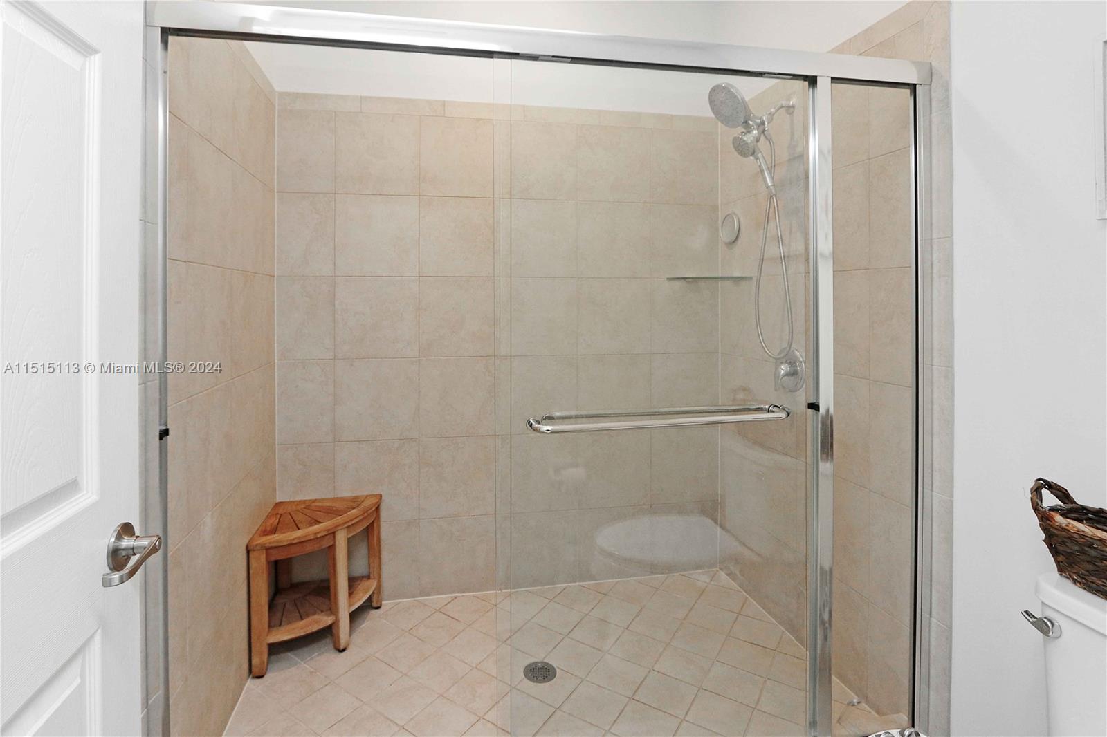 3448 Southeast 3rd Street Homestead, FL 33033 - Photo 16 of 27 a bathroom with a shower and a toilet