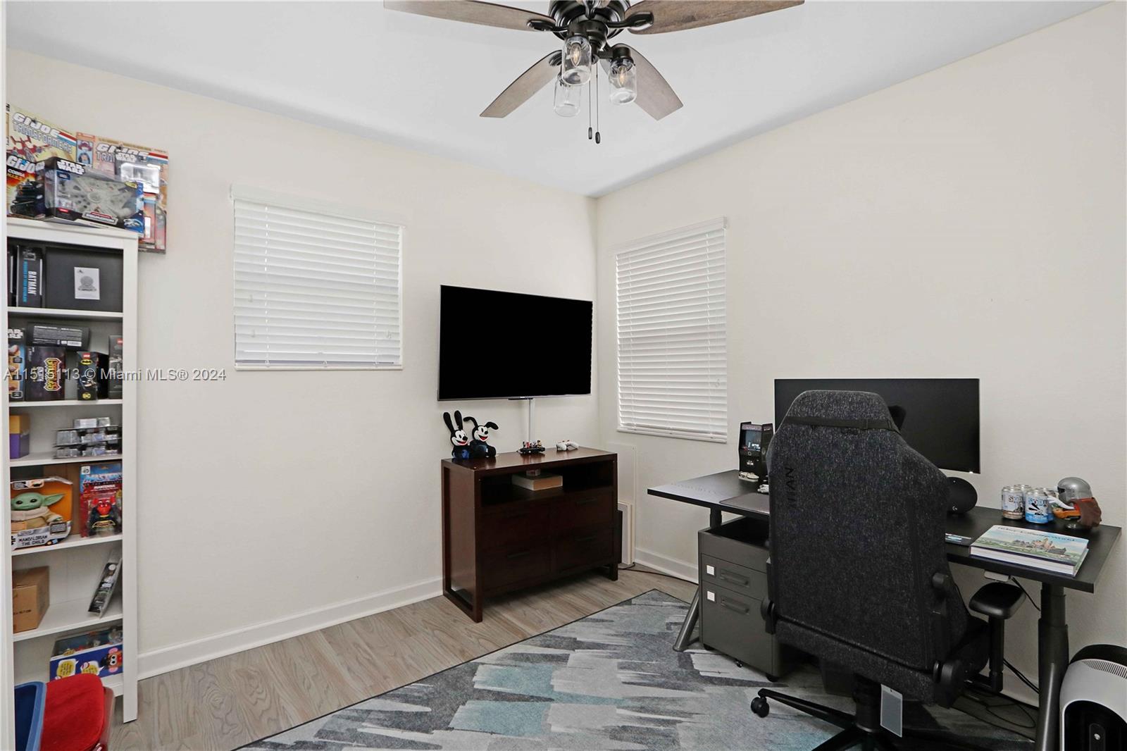 3448 Southeast 3rd Street Homestead, FL 33033 - Photo 19 of 27 a livingroom with workspace and a window