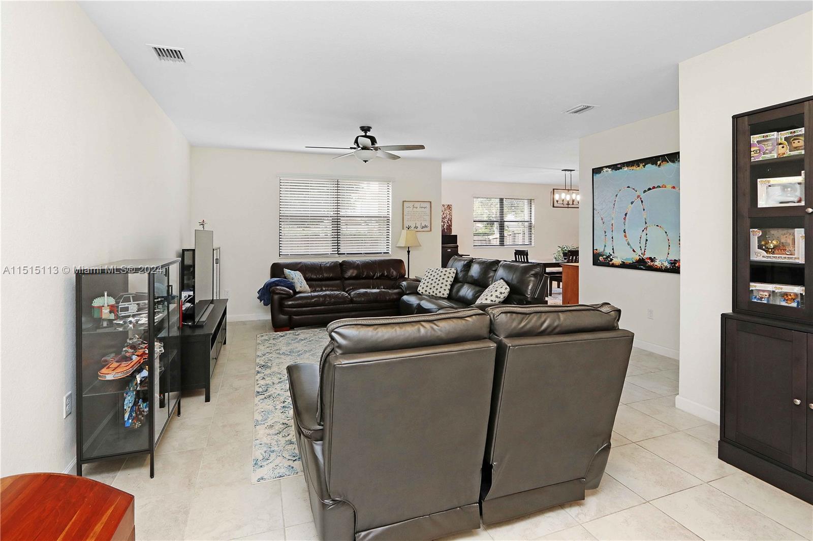 3448 Southeast 3rd Street Homestead, FL 33033 - Photo 5 of 27 a living room with furniture and a window