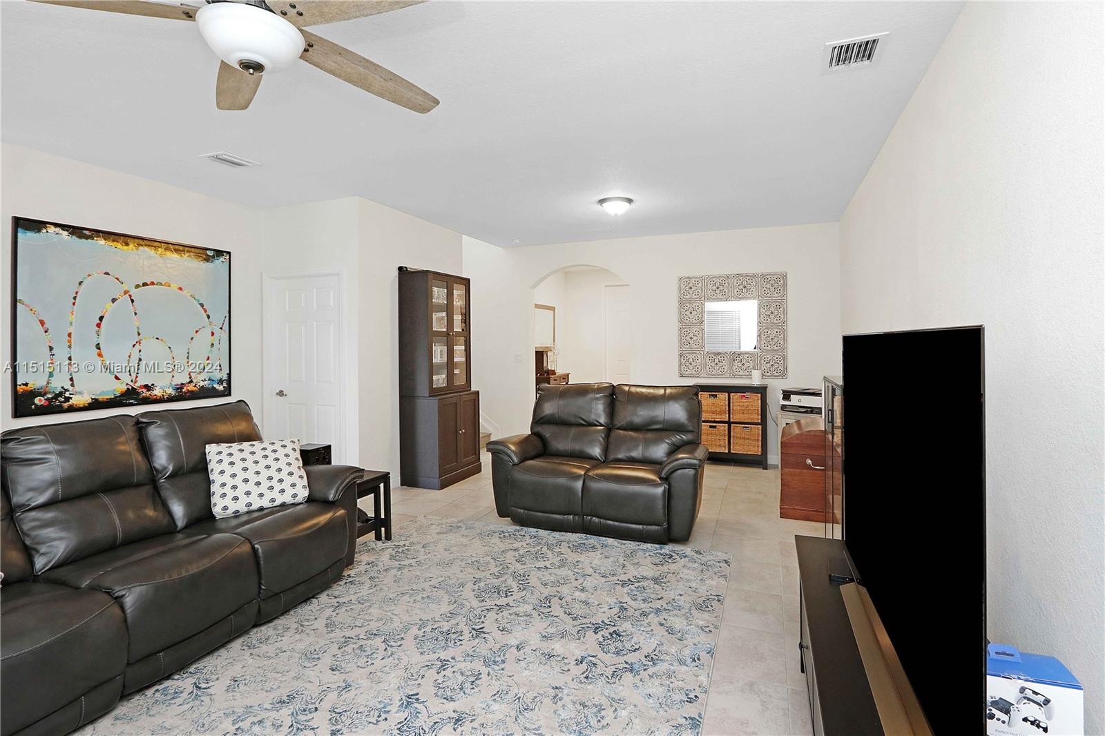 3448 Southeast 3rd Street Homestead, FL 33033 - Photo 6 of 27 a living room with furniture and a couch