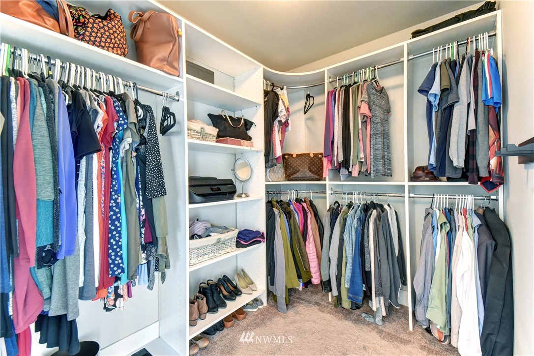 3422 181st Place Southeast Bothell, WA 98012 - Photo 11 of 22 a view of walk in closet with clothes