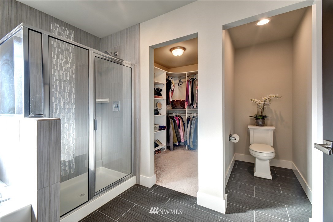 3422 181st Place Southeast Bothell, WA 98012 - Photo 12 of 22 a bathroom with a shower and a toilet