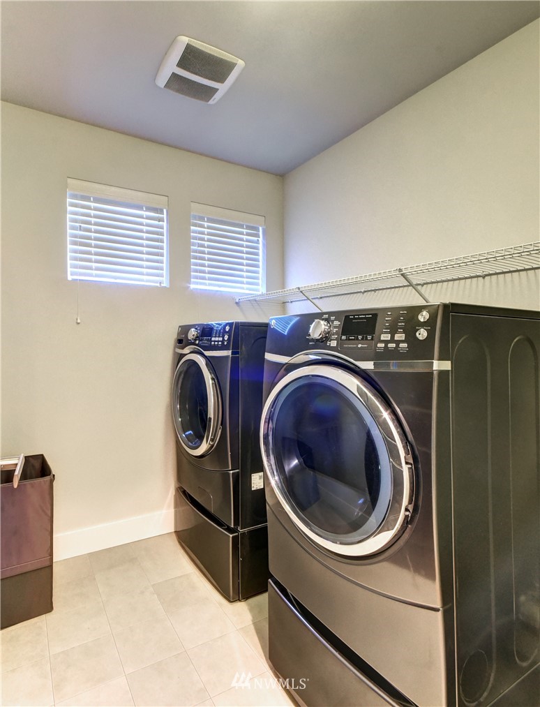 3422 181st Place Southeast Bothell, WA 98012 - Photo 19 of 22 a utility room with dryer and washer