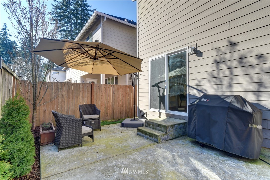 3422 181st Place Southeast Bothell, WA 98012 - Photo 21 of 22 a backyard of a house with outdoor seating