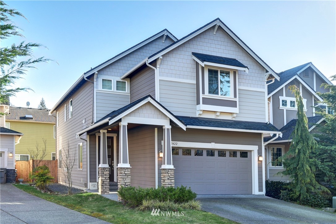 3422 181st Place Southeast Bothell, WA 98012 - Photo 22 of 22 a front view of a house with yard