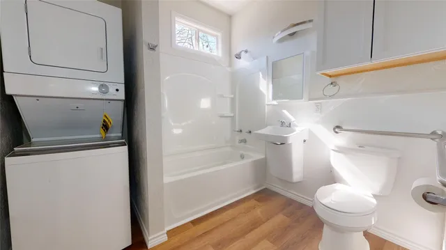 a kitchen with a refrigerator and cabinets
