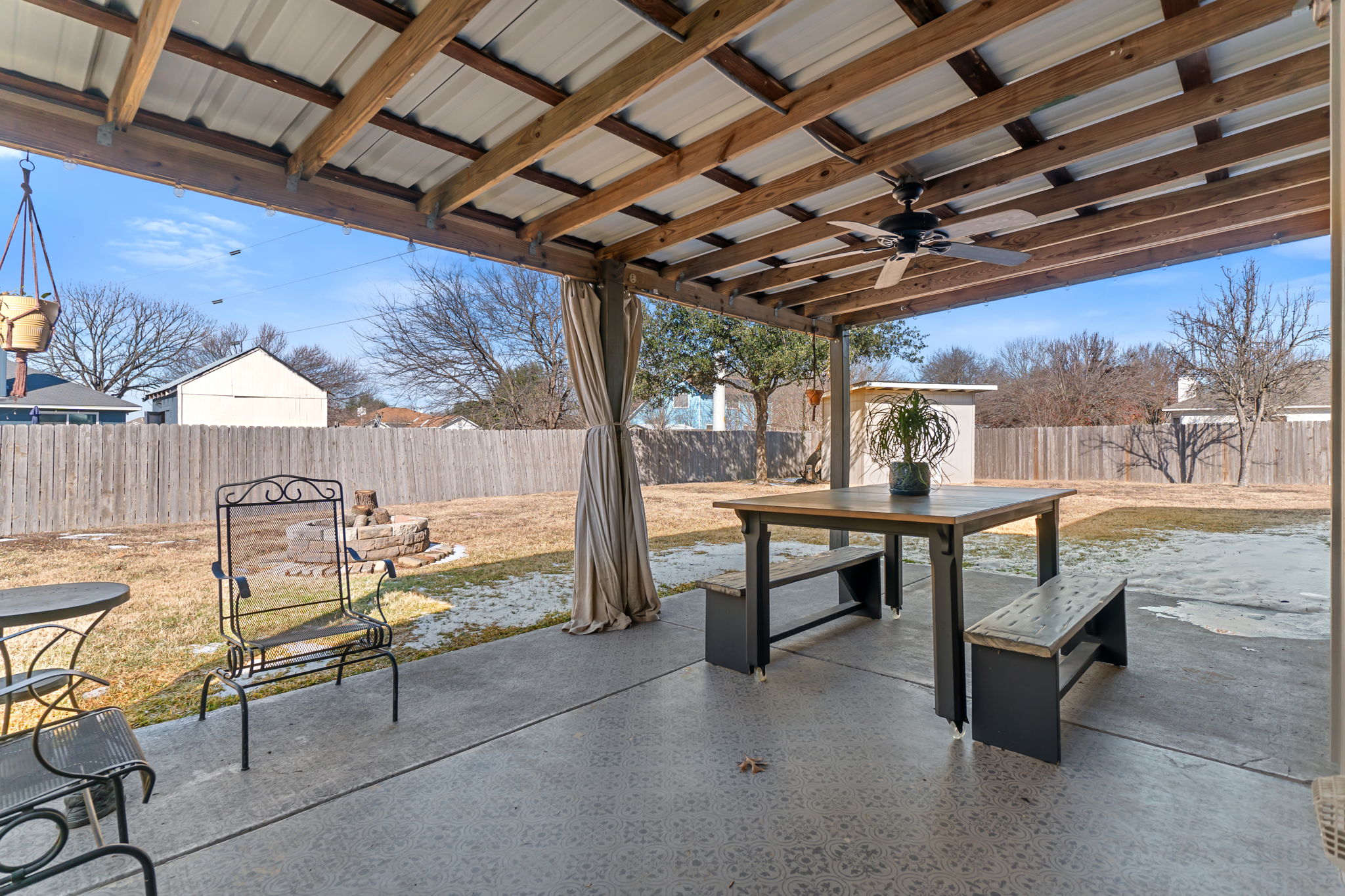 401 Kates Way Hutto, TX 78634 - Photo 31 of 37 Fenced backyard with outdoor dining area, a patio area, and a ceiling fan