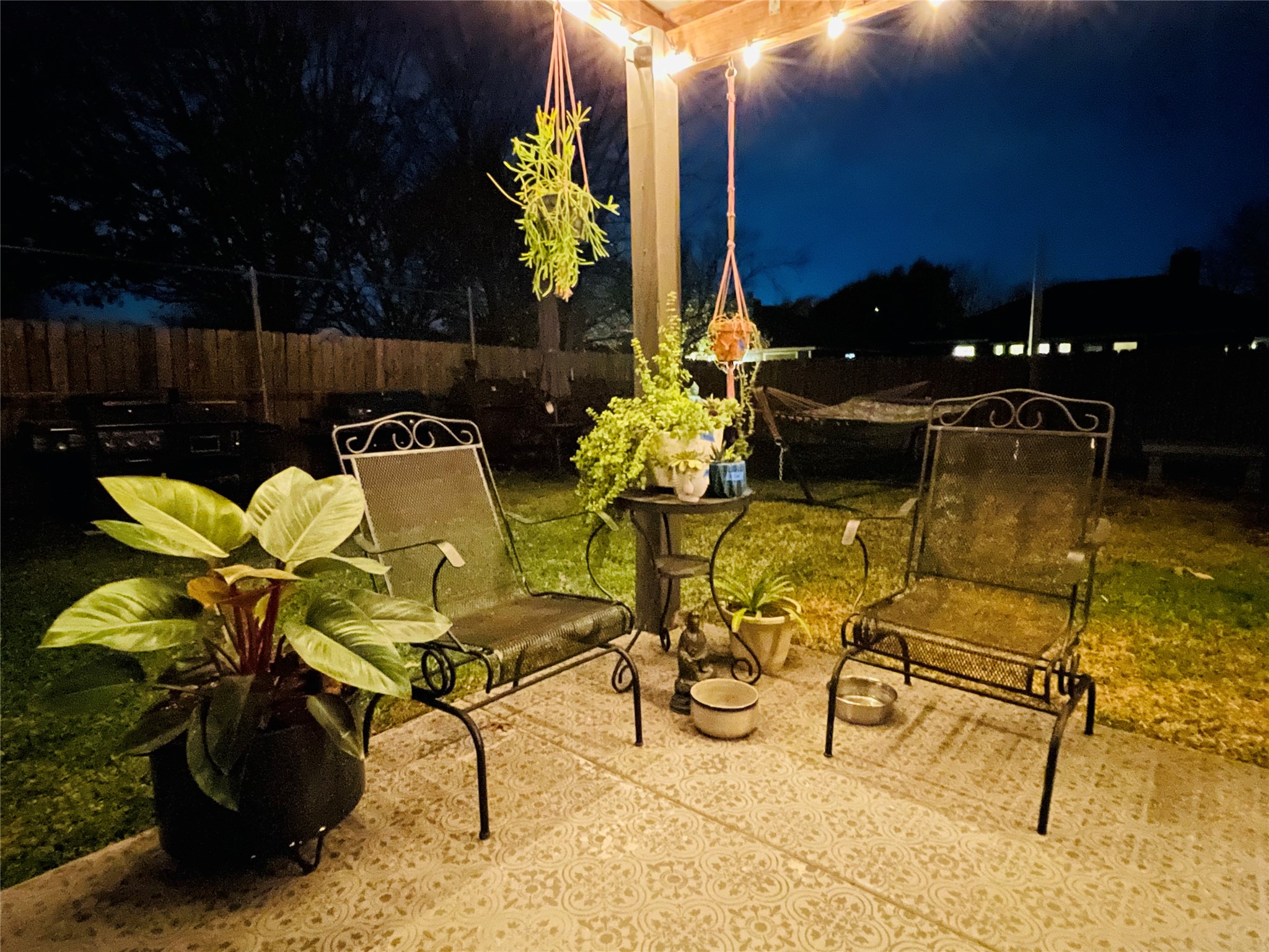401 Kates Way Hutto, TX 78634 - Photo 37 of 37 Patio at night with a patio