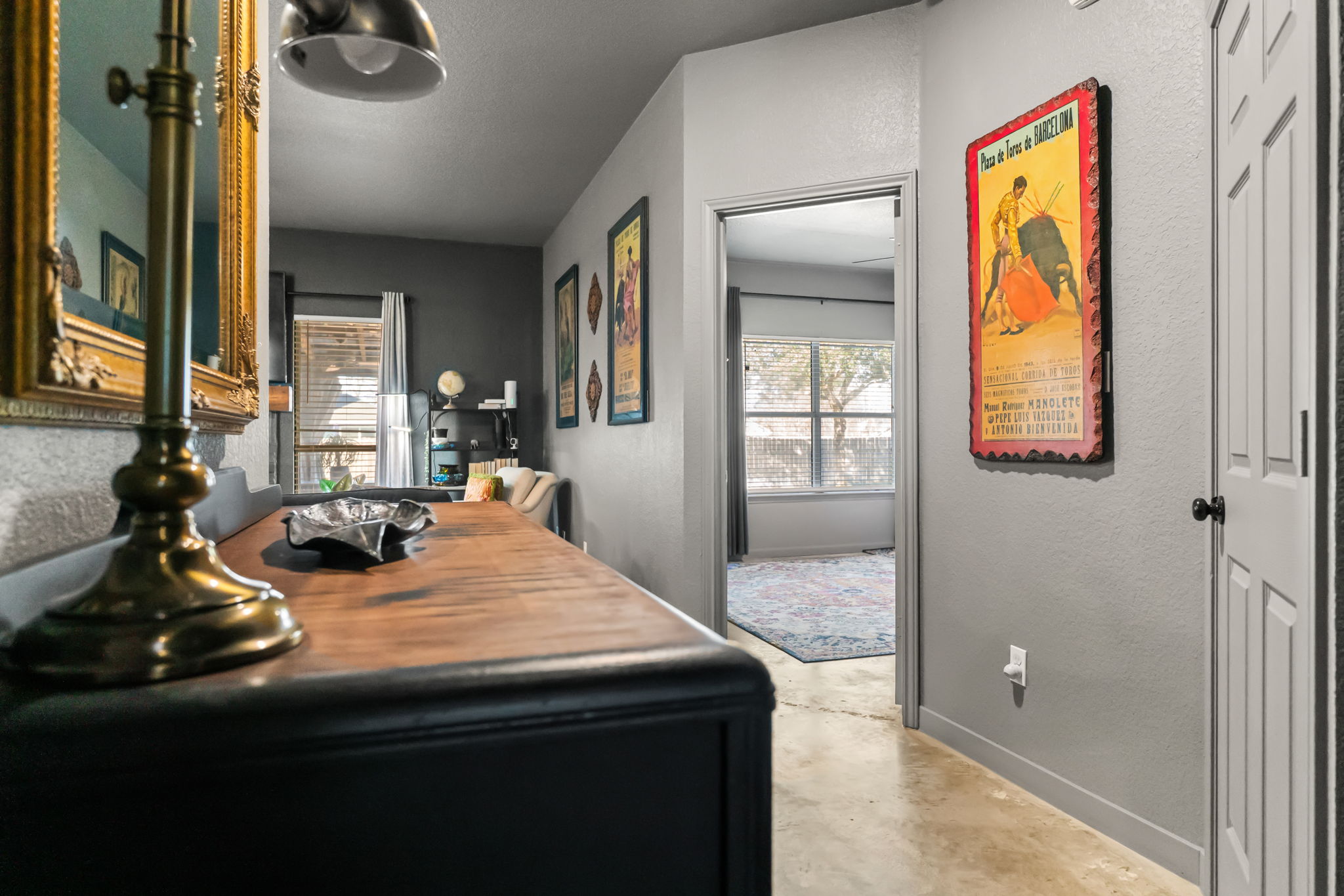 401 Kates Way Hutto, TX 78634 - Photo 4 of 37 Dining room featuring concrete floors and a textured wall