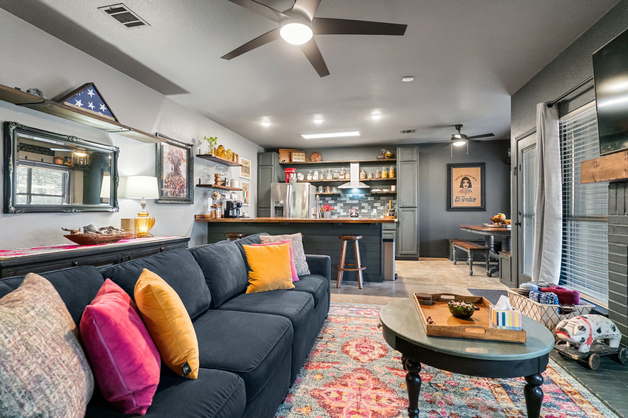 401 Kates Way Hutto, TX 78634 - Photo 8 of 37 Living room with ceiling fan and a dry bar