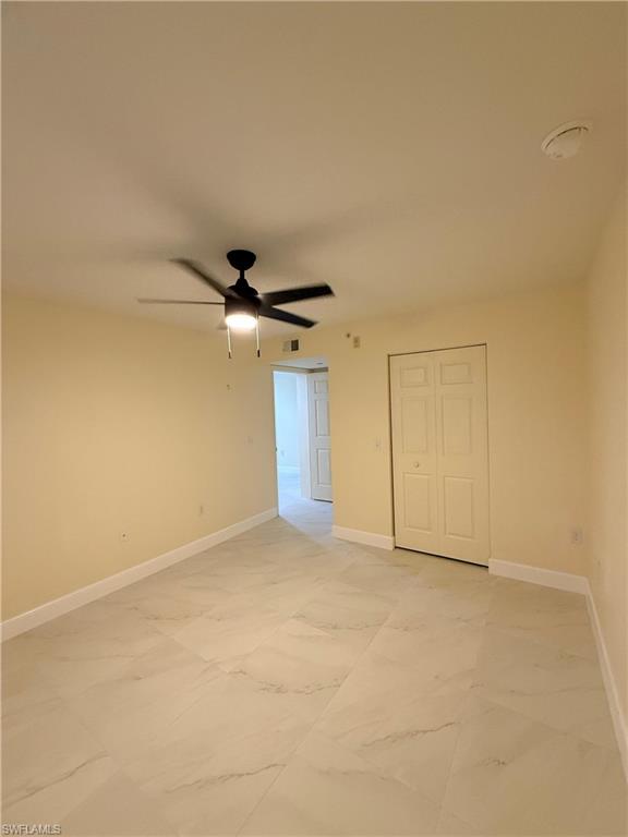 8274 Key Royal Circle, Unit 1012 Naples, FL 34119 - Photo 18 of 20 a view of an empty room
