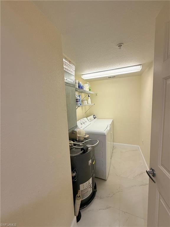 8274 Key Royal Circle, Unit 1012 Naples, FL 34119 - Photo 20 of 20 a utility room with a sink