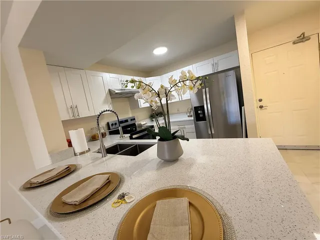 a dining room with furniture and a table