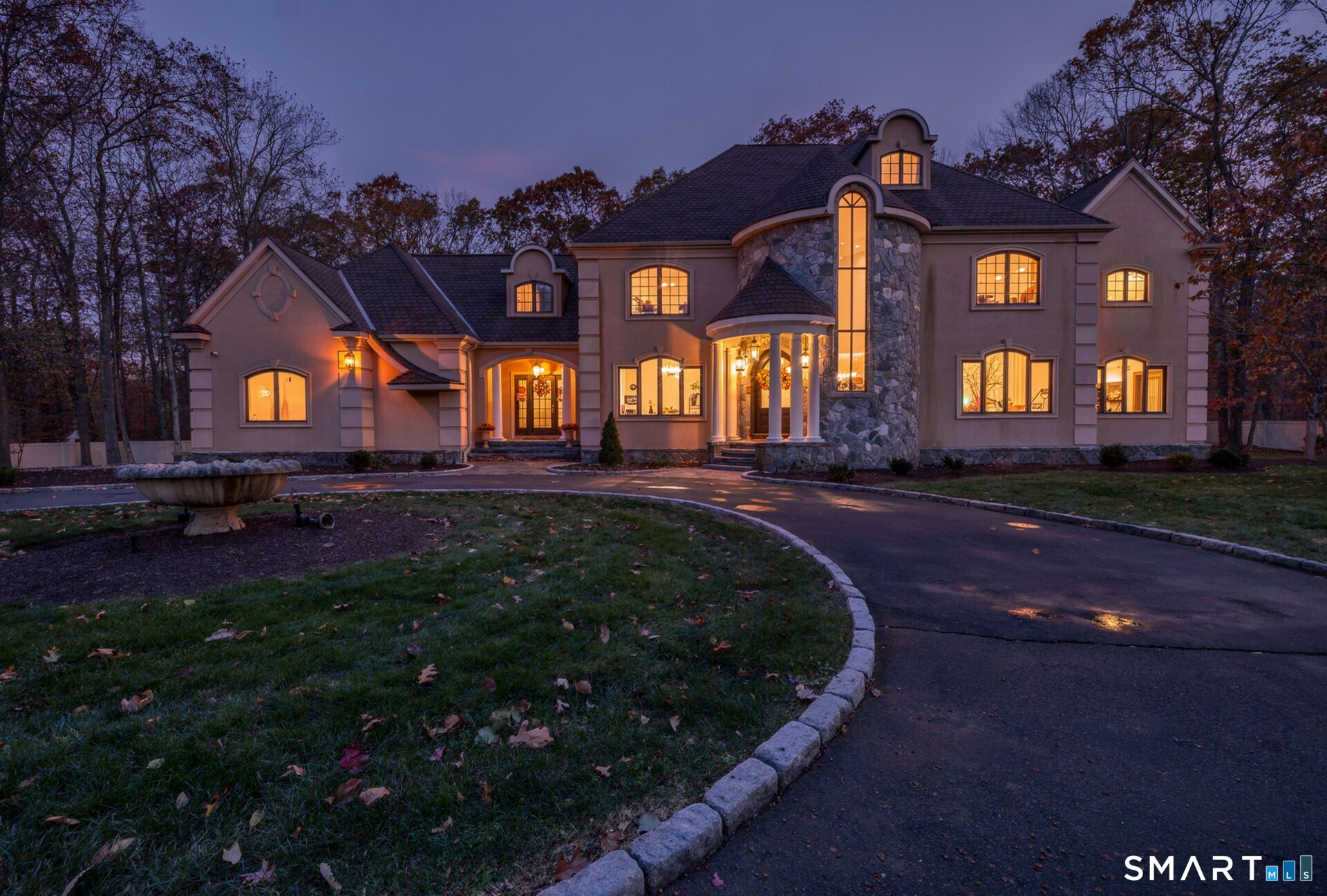 65 Ironwood Road Guilford, CT 06437 - Photo 1 of 40 WELCOME TO THE WOODLANDS... Guilford's premier subdivision. Custom built Mediterranean estate, sited on a 1.84 acre level lot within a cul-de-sac neighborhood.