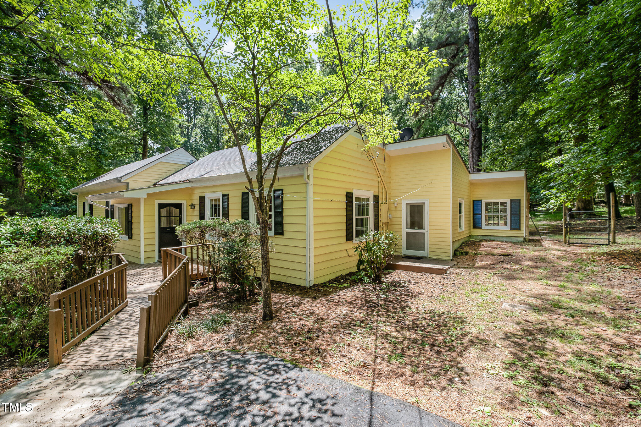 420 Lipscomb Grove Church Road Hillsborough, NC 27278 - Photo 1 of 27 a front view of a house with garden
