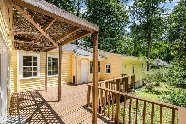 a view of a wooden house with a large window
