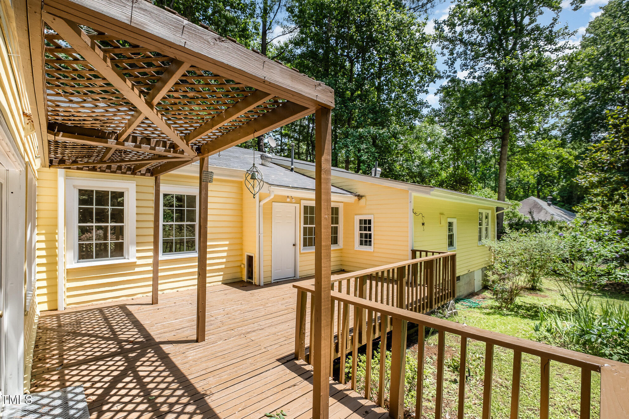 420 Lipscomb Grove Church Road Hillsborough, NC 27278 - Photo 21 of 27 a view of a house with backyard and deck